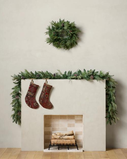 Mantel is pictured with two garland strands.