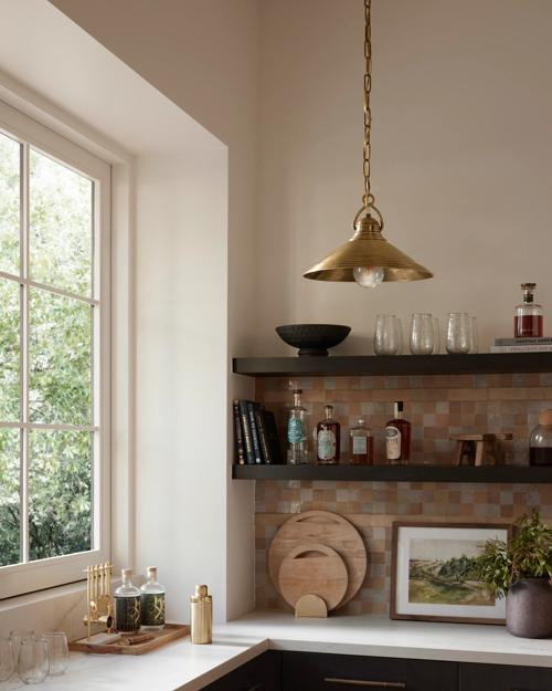 Kitchen countertop featuring Lucienne pendant light and Countryside Scenery Artwork