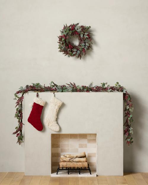 Mantel is pictured with two garland strands.