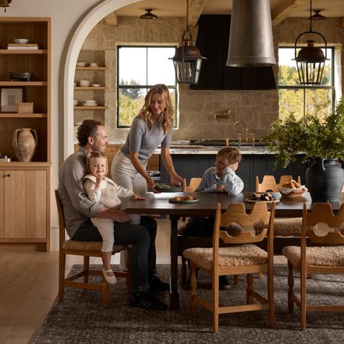 Dining room with family image