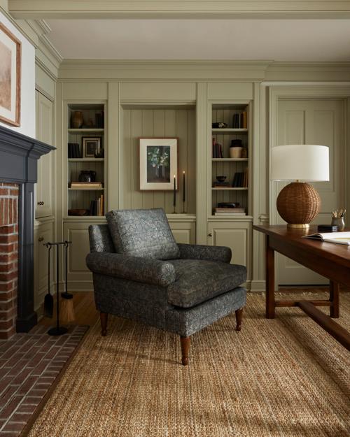 Corner of an office featuring Elston chair and Alisha rug