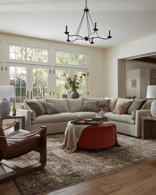 Living Room Featuring Leighton Sectional, Althea Rug and Brynn Ottoman
