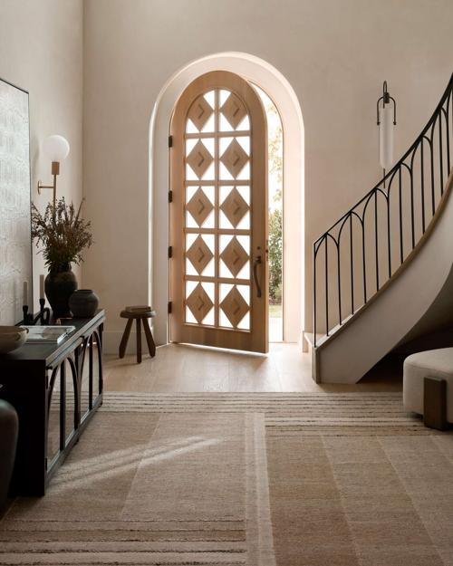 Entryway featuring Sonia Rug